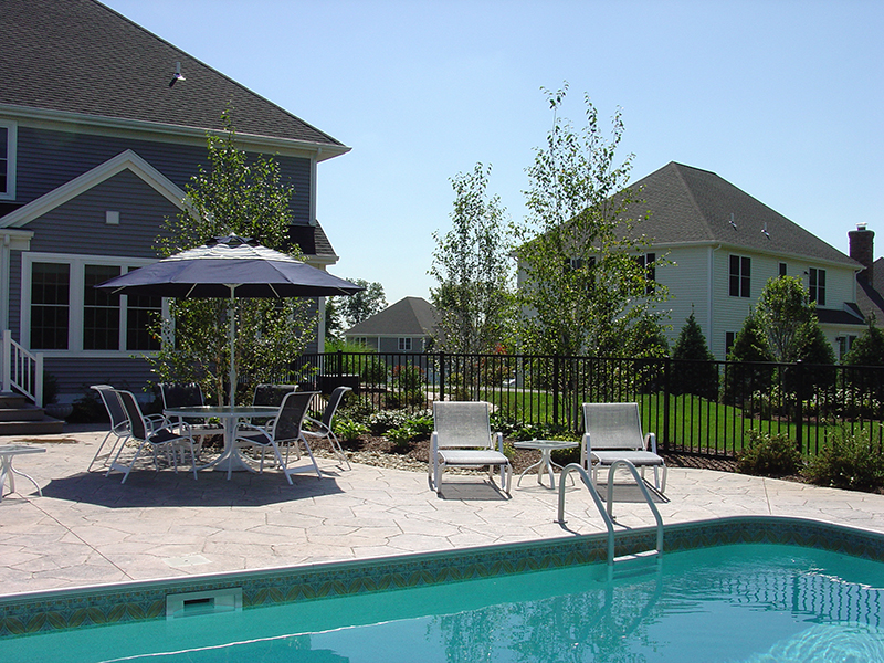 Swimming pool and stamped concrete project example 129